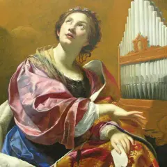 Santa Celia, patrona de la música, mira al cielo junto a un órgano. ¡Qué día tan inspirador para componer!